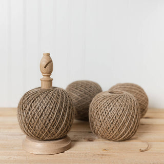 Oak twine stand with a ball of twine
